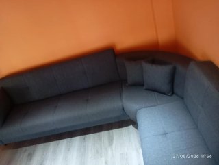 Sofa Rinconera gris abatible cama, Perfecto estado