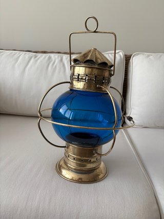 Farol náutico antiguo azul y dorado