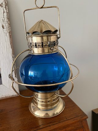 Farol náutico antiguo azul y dorado