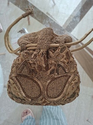 Bolso de fiesta beige y dorado