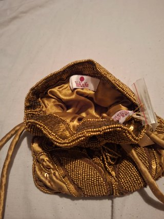 Bolso de fiesta beige y dorado