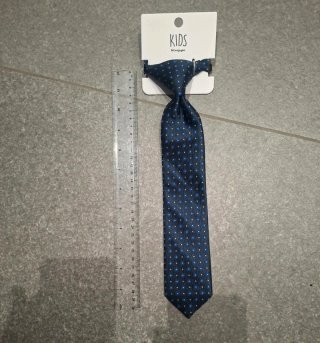 Corbata infantil azul con puntos blancos