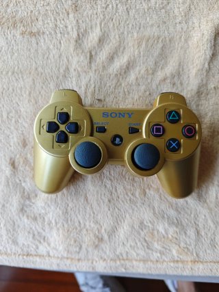 Consola PS3 Negra con 7 Juegos y Mando Dorado