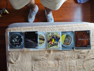 Consola PS3 Negra con 7 Juegos y Mando Dorado