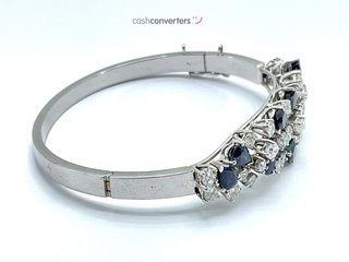 pulsera oro 18k con piedra con diamante,zafiro