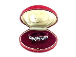 pulsera oro 18k con piedra con diamante,zafiro