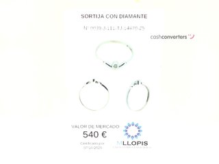anillo oro 18k con piedra con diamante