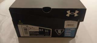 Zapatillas de Golf Under Armour Blancas y Doradas