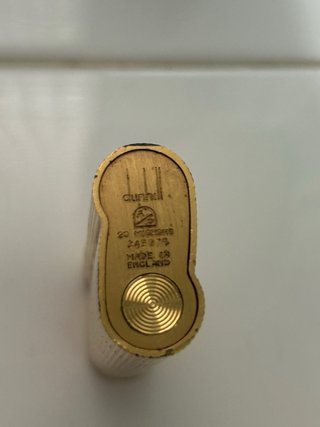 Mechero antiguo bañado en oro