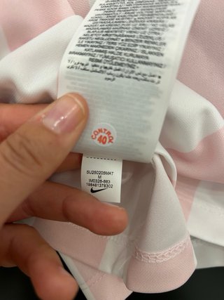 Camiseta corta Nike rayas rosa y blanco