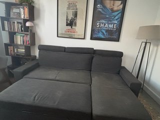 Sofá chaiselongue Ikea gris con cama y canapé