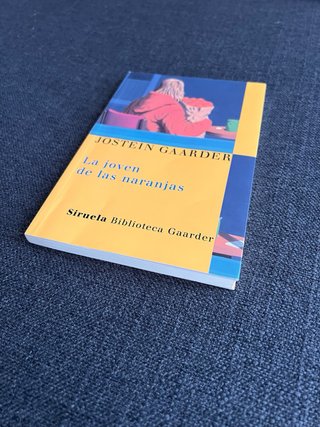 La joven de las naranjas