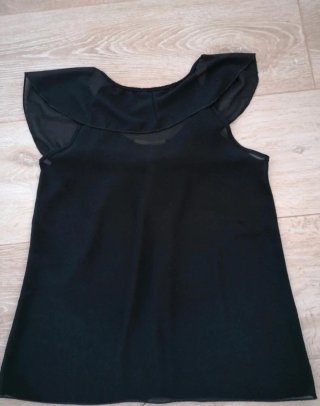 Blusa de gasa negra