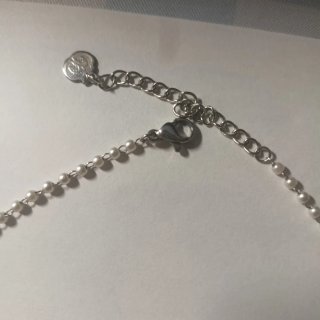 Collar de corazones plateados