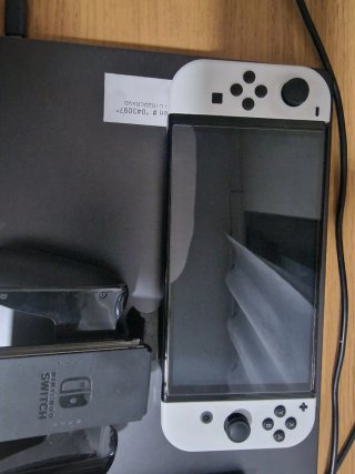 Nintendo Switch OLED Bianca e Nera, come nuova