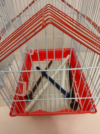 Jaula para pájaros con diseño de casa