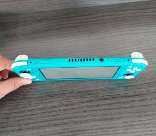 Nintendo Switch Lite + Funda