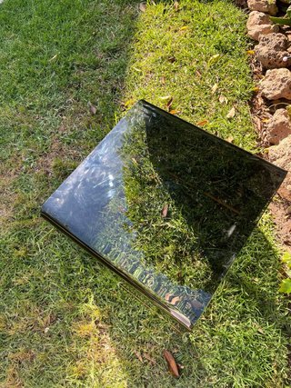 Mesa de centro de cristal ahumado