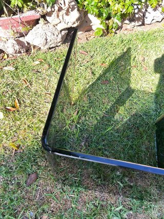 Mesa de centro de cristal ahumado