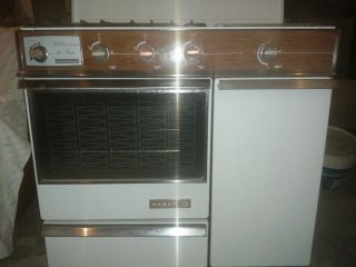 Cocina de gas con horno y vitrocerámica