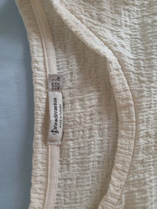 Conjunto falda mango S y camiseta stradivarius L