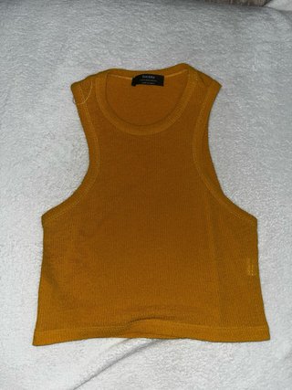 Tops sin mangas Lefties y Bershka  tallas S y M
