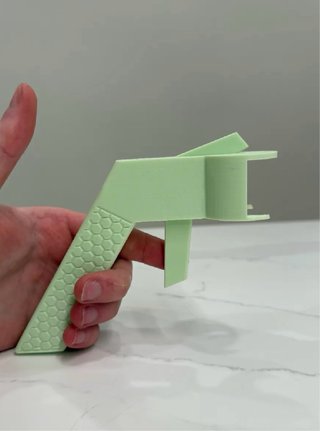 Soporte ergonómico para spray (aerosoles)