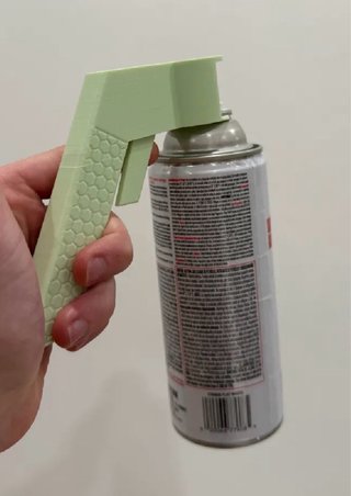 Soporte ergonómico para spray (aerosoles)