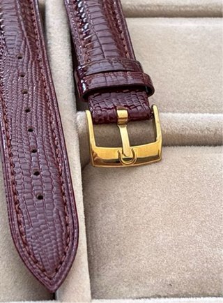 Correas de reloj negras y doradas