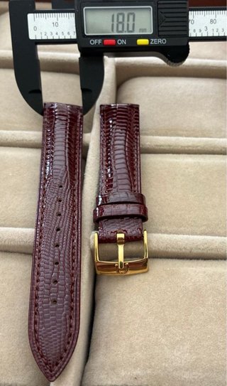 Correas de reloj negras y doradas