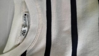 Jersey rayas blancas y negras con hombreras