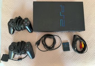 PlayStation 2 con 2 mandos y tarjeta