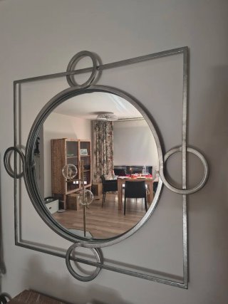 Espejo decorativo plateado,