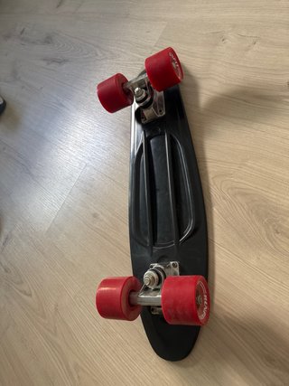 Patinete Penny Negro Ruedas Rojas