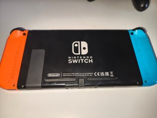 Nintendo Switch + Funda + Tarjeta 32GB + Juegos