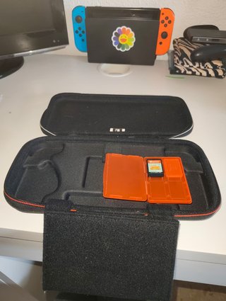 Nintendo Switch + Funda + Tarjeta 32GB + Juegos