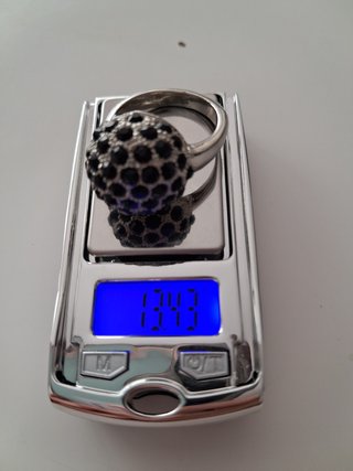 Anillo con piedras negras y plata