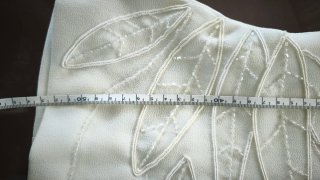 Top blanco Nicchi bordado hojas