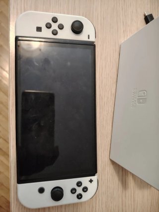 Nintendo Switch OLED Bianca + Giochi
