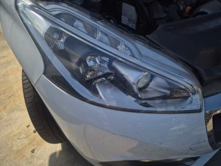 Defensa peugeot 208 impecable
