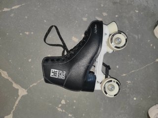 Patines negros 4 ruedas KRF SCHOOL y bolsa