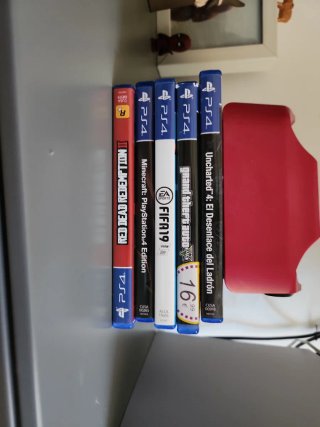 Ps5 con lector+mando, 5 juegos y puerto de carga