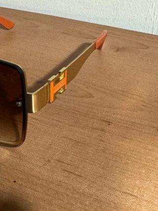 Gafas de sol Hermes doradas y marrones