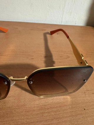 Gafas de sol Hermes doradas y marrones