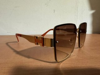 Gafas de sol Hermes doradas y marrones