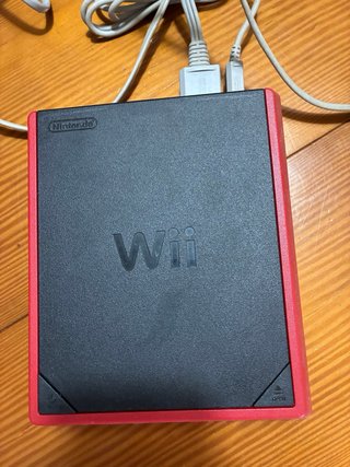 Nintendo Wii con 2 mandos y 2 micrófonos
