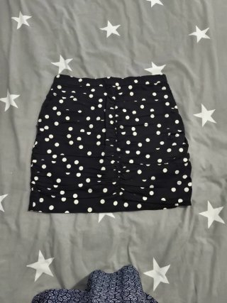 Falda corta lunares