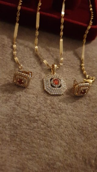 Conjunto chapado en oro 18k con piedras naranjas