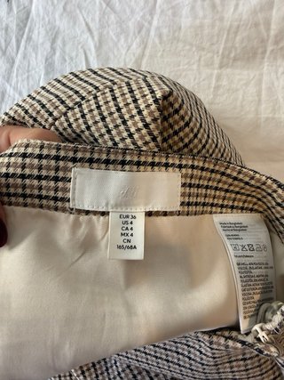 Falda H&M cuadros beige y negro