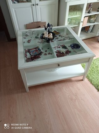 Mesa de centro de cristal y madera